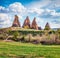 Sunny summer scene of Cappadocia. Splendid morning view of Red Rose valley. Cavusin village located, district of Nevsehir, Turkey,