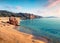 Sunny summer seascape of Aegean Sea. Beautiful marine landscape of Cuba Beach, Olimpiada village location, Greeace, Europe.