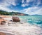 Sunny summer seascape of Aegean Sea. Beautiful marine landscape of Cuba Beach, Olimpiada village location, Greeace, Europe.