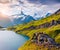 Sunny summer sunrise on Bachalpsee lake with Schreckhorn peak on background. Aerial morning view of the Swiss Bernese Alps, Switze