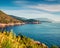 Sunny summer view from Ierussalim Beach. Picturesque morning seascape of Ionian sea. Impressive sunrise on Kefalonia Island, Greec