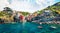 Sunny summer view of  Riomaggiore - Cique Terre sequence of hill cities. Wonderful morning view of Liguria, Italy, Europe.