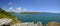 Sunny summer views from near Bolt Head over Starehole Bay, towards the Salcombe estuary and Prawle Point, Devon, UK