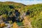 Sunny view of the fall color of Turner Falls