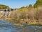 Sunny view of the landscape of Beaver River in Beavers Bend State Park