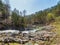 Sunny view of the landscape of Beaver River in Beavers Bend State Park