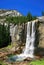 Sunny view of the Vernal Fall with a rainbow below
