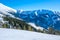 Sunny Weather Over Empty Ski Slope and Mountain Relief