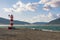 Sunny and windy winter day, beautiful Mediterranean landscape. Montenegro, Tivat. View of Bay of Kotor with beacon