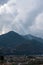 A Sunray Shining through the Clouds on a Hill