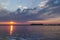 Sunrays over a Colorado Lake at sunrise