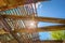 Sunrays Through Wooden Destroyed Roof Of Abandoned House In Exclusion