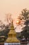 sunrise above pagodas at Wat Chedi Luang