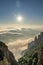 Sunrise above sea of clouds view from Montserrat outside Barcelona in winter