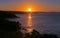 Sunrise across St Brides Bay from Porthclais