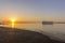 Sunrise aerial seascape view of Olhao dockyard, waterfront to Ria Formosa natural park with Armona island in background