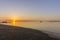 Sunrise aerial seascape view of Olhao dockyard, waterfront to Ria Formosa natural park with Armona island in background