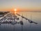 Sunrise aerial seascape view of Olhao Marina, waterfront to Ria Formosa natural park.