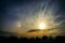 Sunrise against the sky and cumulus clouds