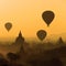 Sunrise balloons over Bagan.
