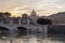 Sunrise of the Basilica St Peter in Rome, Italy. River, city.