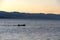 Before sunrise on the beach, early morning seaside activity