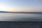 Before sunrise on the beach, early morning seaside activity