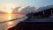 Sunrise by the beach with traditional boats in Bali