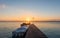 Sunrise on the boardwalk in Bacalar, Mexico