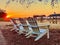 Sunrise broken pier Adirondack chairs The grand Lodge Marriott signature hotel point clear Fairhope Alabama