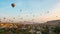 Sunrise in Cappadocia with flying balloon in Cappadocia city skyline in Goreme, Turkey time lapse