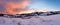 Sunrise Carpathian mountain winter panorama.