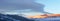 Sunrise Carpathian mountain winter panorama.