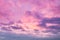 Sunrise clouds skyscape soft pink and purple tones. Majestic summer day cloudy weather. Romantic sky