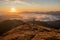 Sunrise with cross, below foggy valley, Ogradi, Bohinj