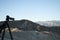 Sunrise at Death Valley, California. Professional photographer`s equipment in the front of the view