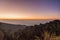 Sunrise at Doi Inthanon, mountain view misty morning of alone tree and many hills with red sky background