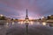 Sunrise on the Eiffel tower reflection