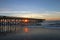 Sunrise through fishing pier at Isle of Palms SC