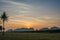 Sunrise at grass filed in Samroiyod nation park, Thailand