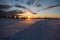 Sunrise on hedmarksvidda in Norway with skiing tracks. Snow covered ground with a lot of snow