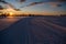 Sunrise on hedmarksvidda in Norway with skiing tracks. Snow covered ground with a lot of snow