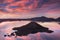 Sunrise at Hillman Peak, Crater Lake National Park with summer scene. Panoramic view of the deepest lake in USA.