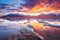 sunrise illuminating a salt lagoon with mountains in the background