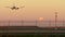Sunrise Jet Landing as Full Moon Sets 4K UHD