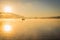 Sunrise at the lake Kawaguchiko,People fishing on a boat,silhoue