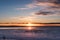 Sunrise landscaped with silhouette horse at winter in countryside, South Iceland