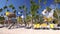 Sunrise with life guard  and sun chairs on tropical exotic beach, Punta Cana