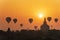 Sunrise many hot air balloon in Bagan, Myanmar. Bagan is an ancient with many pagoda of historic buddhist temples and stupas. The