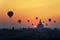 Sunrise many hot air balloon in Bagan, Myanmar. Bagan is an ancient with many pagoda of historic buddhist temples and stupas. The